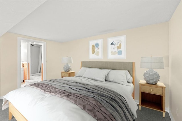 bedroom featuring carpet and baseboards