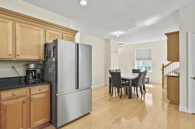 508 Linwood Ct Unit 508, Clinton, MA 01510 - kitchen with freestanding refrigerator, dark countertops, light wood finished floors, and recessed lighting