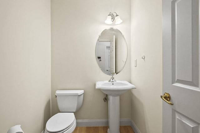 508 Linwood Ct Unit 508, Clinton, MA 01510 - half bath featuring toilet and wood finished floors