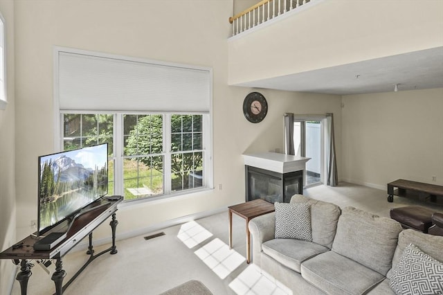 508 Linwood Ct Unit 508, Clinton, MA 01510 - living area with carpet floors and a multi sided fireplace