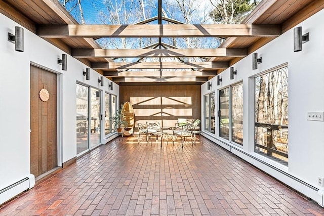 unfurnished sunroom featuring a baseboard radiator, wooden ceiling, and beam ceiling