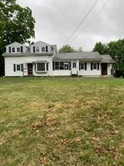 273 Dunhamtown Palmer Rd, Brimfield, MA 01010 - view of front facade with a front yard