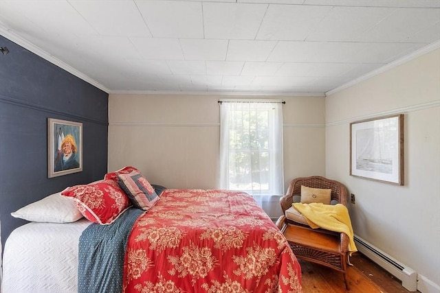 24 Summit Ave, Chelmsford, MA 01824 - bedroom with baseboard heating, wood finished floors, and crown molding