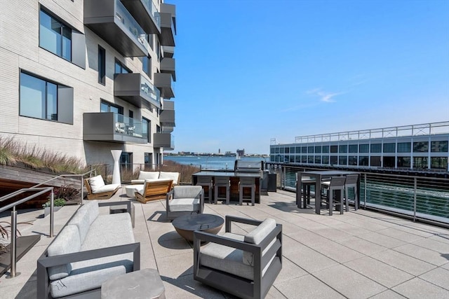 view of patio / terrace with a water view