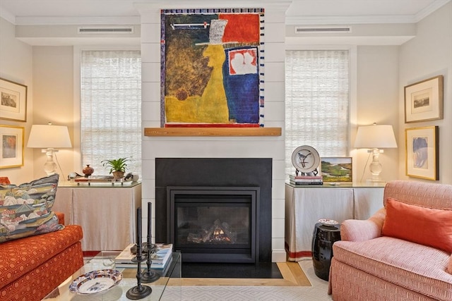350 Bradford St Unit 7, Provincetown, MA 02657 - living area featuring ornamental molding, plenty of natural light, and a large fireplace
