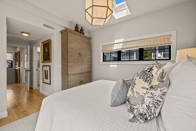 350 Bradford St Unit 7, Provincetown, MA 02657 - bedroom featuring wood finished floors and a skylight