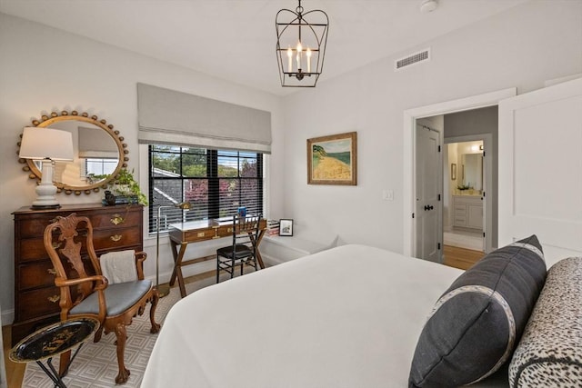 350 Bradford St Unit 7, Provincetown, MA 02657 - bedroom featuring a chandelier and ensuite bath