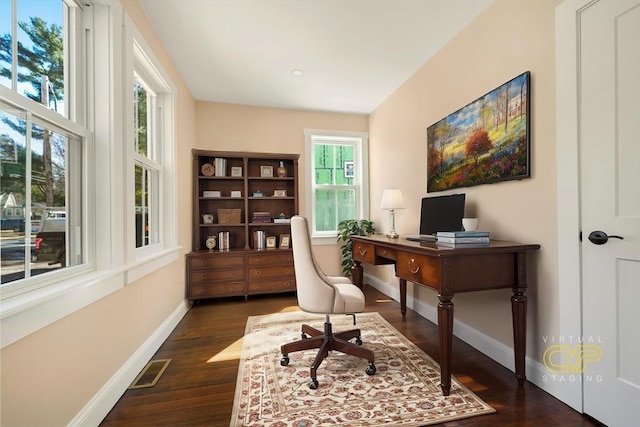 office area featuring dark wood-style floors, visible vents, and baseboards