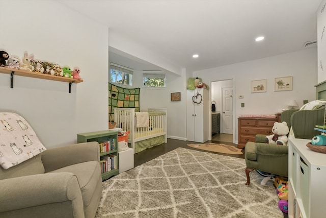 living area with dark hardwood / wood-style flooring