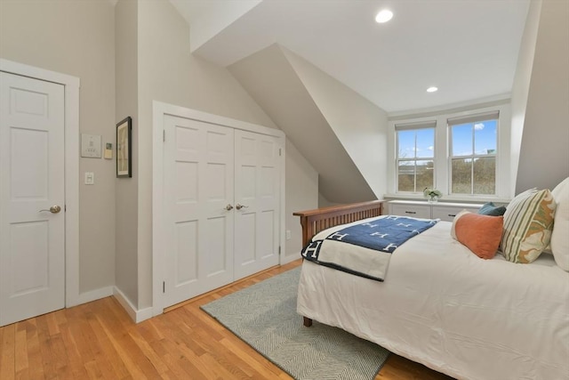 bedroom featuring a closet and light hardwood / wood-style flooring