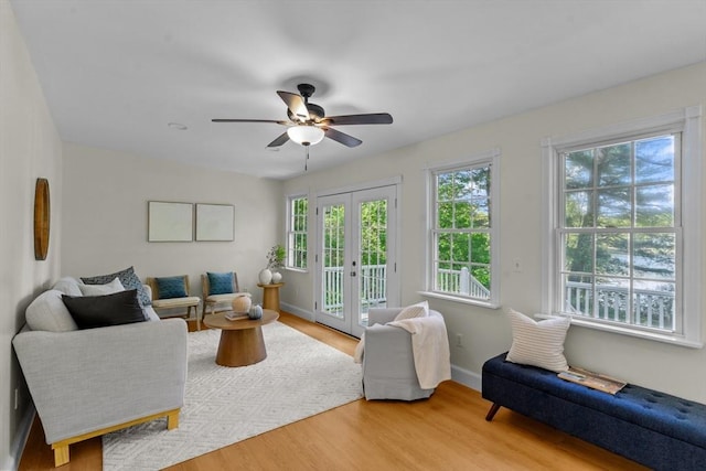 31 Brookside Dr, North Smithfield, RI 02896 - living room featuring light wood-style flooring, ceiling fan, and baseboards
