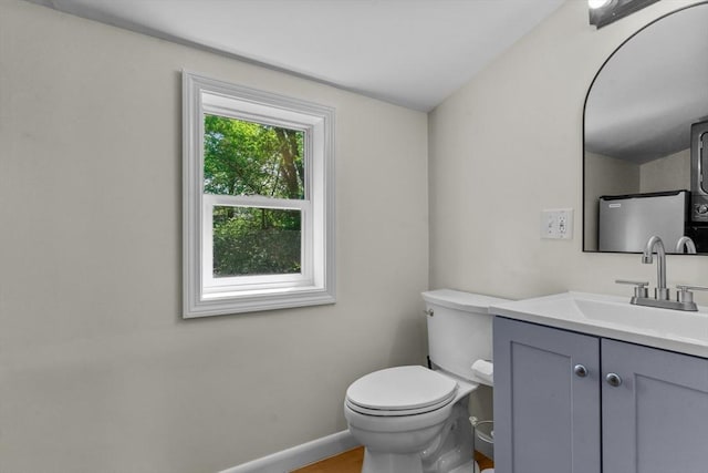 31 Brookside Dr, North Smithfield, RI 02896 - bathroom featuring toilet, vanity, and baseboards