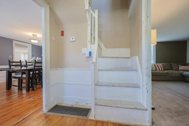 137 High St, Danvers, MA 01923 - stairway with wainscoting and hardwood / wood-style flooring
