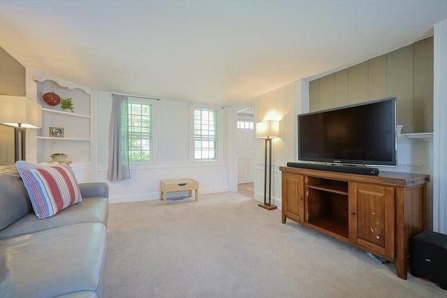 137 High St, Danvers, MA 01923 - living area featuring light colored carpet and built in features
