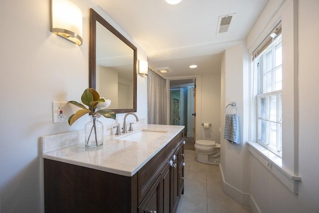 137 High St, Danvers, MA 01923 - bathroom with vanity and tile patterned flooring