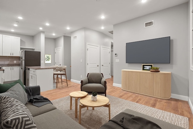 living room featuring light hardwood / wood-style flooring