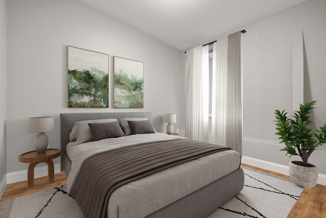 bedroom with light hardwood / wood-style flooring