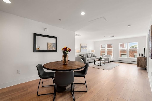 1 Davenport St Unit 11, Cambridge, MA 02140 - dining room with light wood-style flooring, recessed lighting, a baseboard radiator, and baseboards