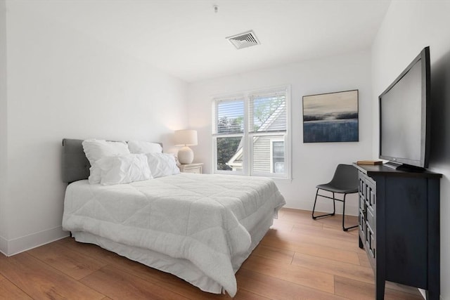 1 Davenport St Unit 11, Cambridge, MA 02140 - bedroom with light wood-style flooring and baseboards