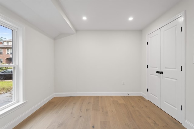 unfurnished room featuring light wood-type flooring