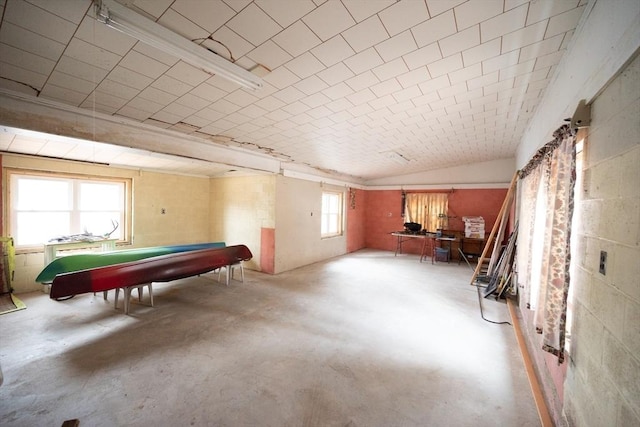 game room with unfinished concrete floors and billiards