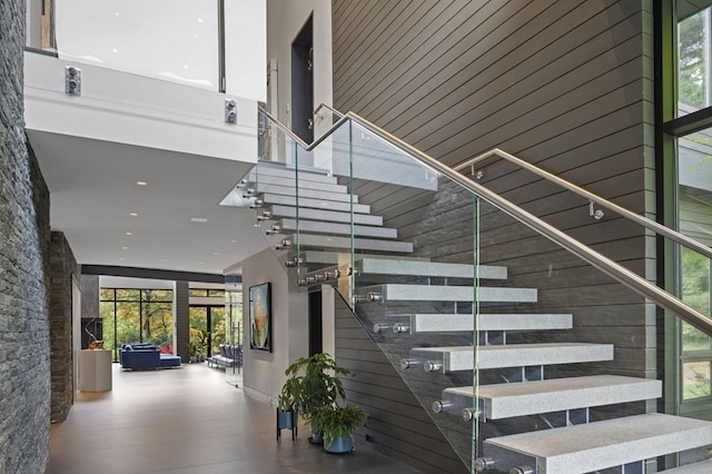 stairway featuring dark hardwood / wood-style floors