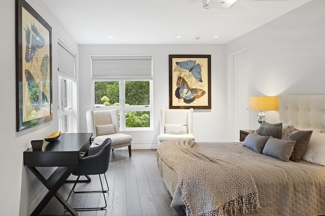 bedroom with wood-type flooring