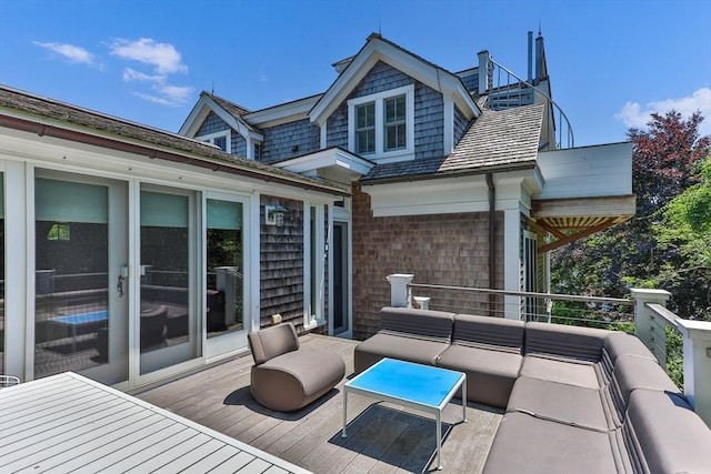 wooden deck featuring outdoor lounge area