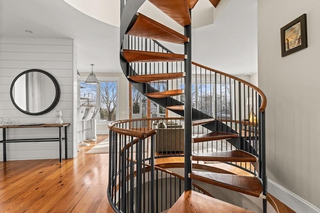 stairway featuring hardwood / wood-style flooring