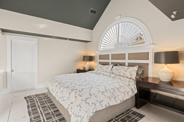 bedroom with lofted ceiling