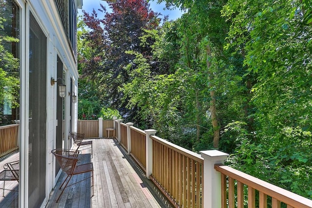 wooden balcony featuring a wooden deck