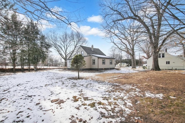 view of yard covered in snow