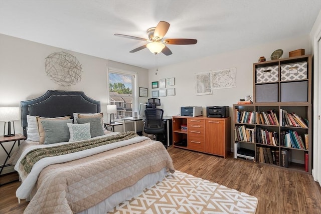 42 Sycamore Dr Unit 42, Leominster, MA 01453 - bedroom with a desk, wood finished floors, and a ceiling fan