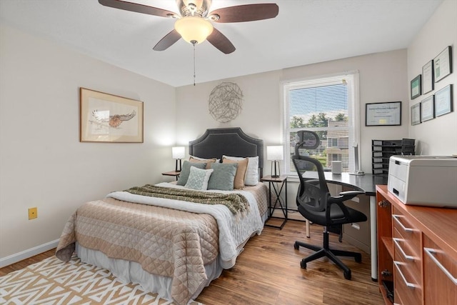 42 Sycamore Dr Unit 42, Leominster, MA 01453 - bedroom with an office area, wood finished floors, and a ceiling fan