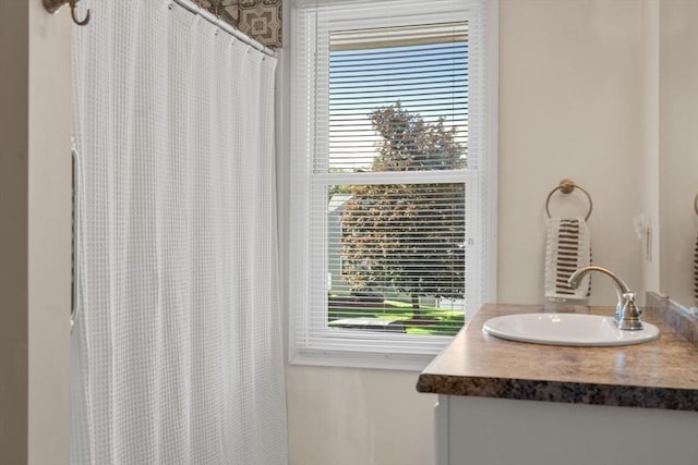 42 Sycamore Dr Unit 42, Leominster, MA 01453 - bathroom with vanity, plenty of natural light, and curtained shower