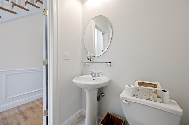 136 Howard St, Northborough, MA 01532 - bathroom featuring toilet, wood finished floors, and a sink