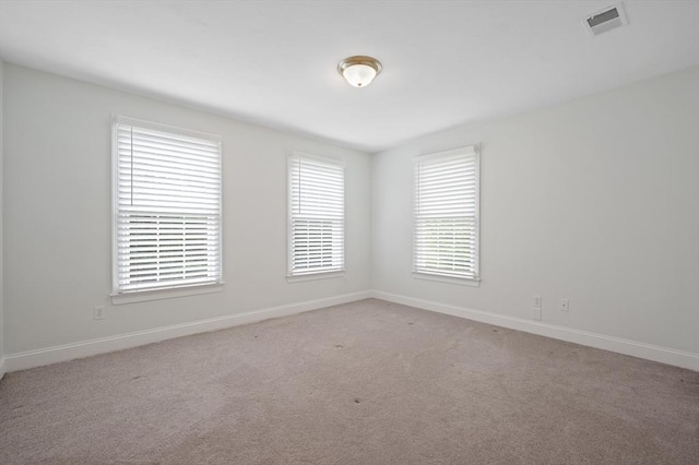 136 Howard St, Northborough, MA 01532 - empty room featuring baseboards and light colored carpet