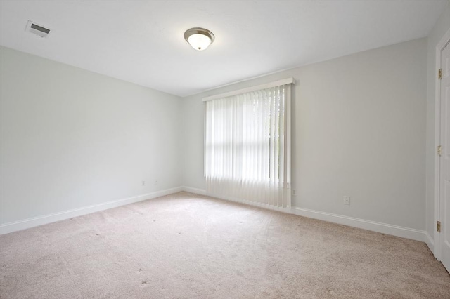 136 Howard St, Northborough, MA 01532 - spare room with light colored carpet and baseboards