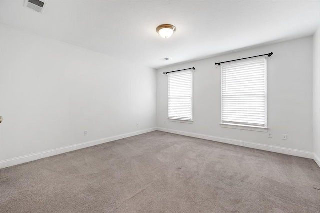 136 Howard St, Northborough, MA 01532 - carpeted spare room featuring baseboards