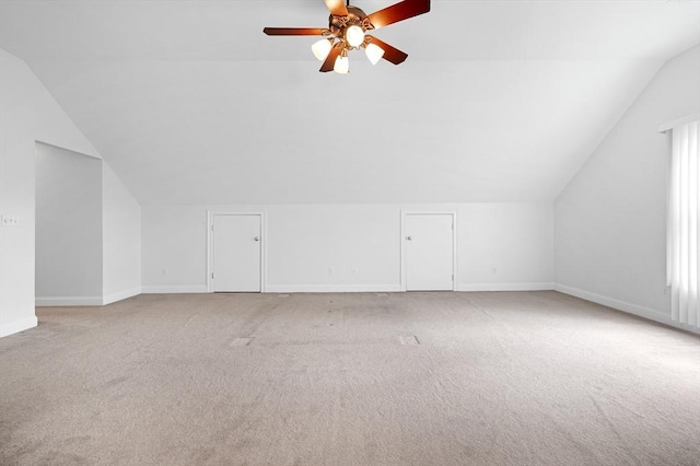 136 Howard St, Northborough, MA 01532 - additional living space featuring vaulted ceiling, light carpet, ceiling fan, and baseboards
