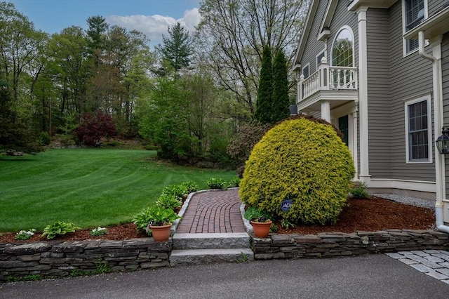 136 Howard St, Northborough, MA 01532 - view of green lawn featuring a balcony