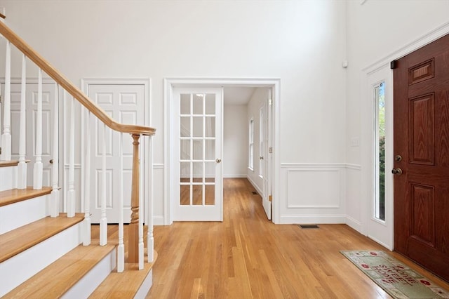136 Howard St, Northborough, MA 01532 - entryway featuring stairway and light wood-style floors