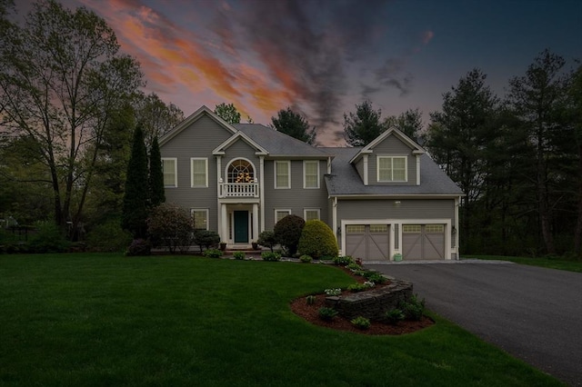 136 Howard St, Northborough, MA 01532 - view of front of house featuring asphalt driveway and a yard