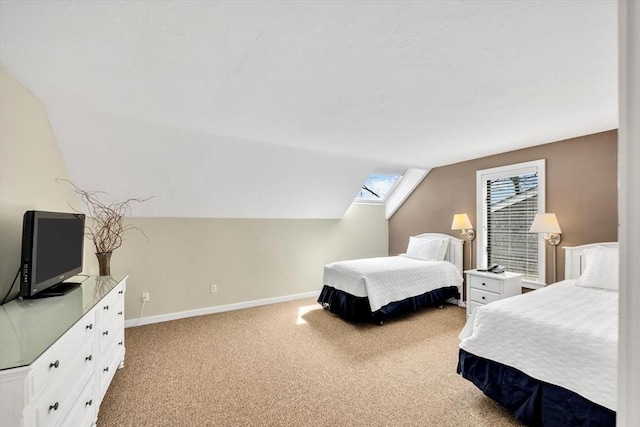 10 Lanyard Way Unit 7239, Mashpee, MA 02649 - carpeted bedroom with lofted ceiling, baseboards, and a skylight