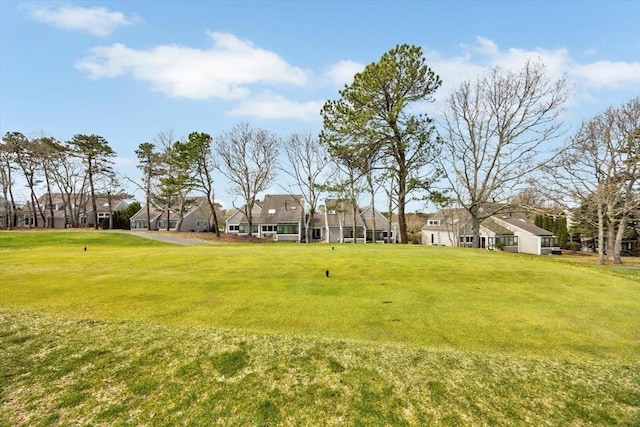 10 Lanyard Way Unit 7239, Mashpee, MA 02649 - view of green lawn featuring a residential view