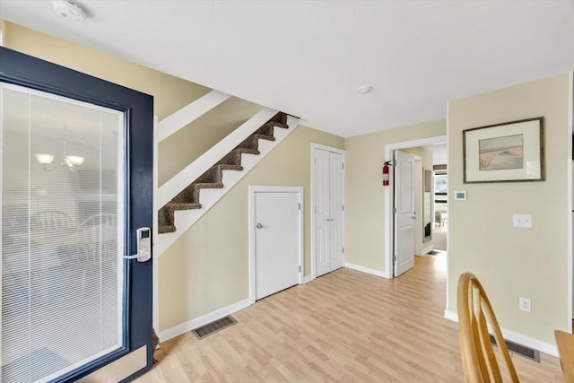 10 Lanyard Way Unit 7239, Mashpee, MA 02649 - staircase with wood finished floors and baseboards
