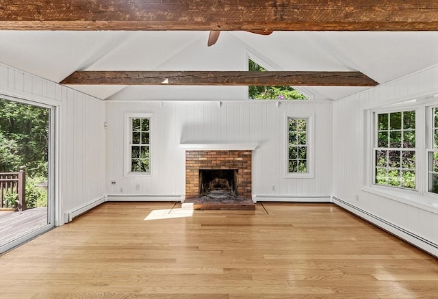 92 Clinton St, Hopkinton, MA 01748 - unfurnished living room featuring light wood finished floors, a baseboard heating unit, a fireplace, and wood walls