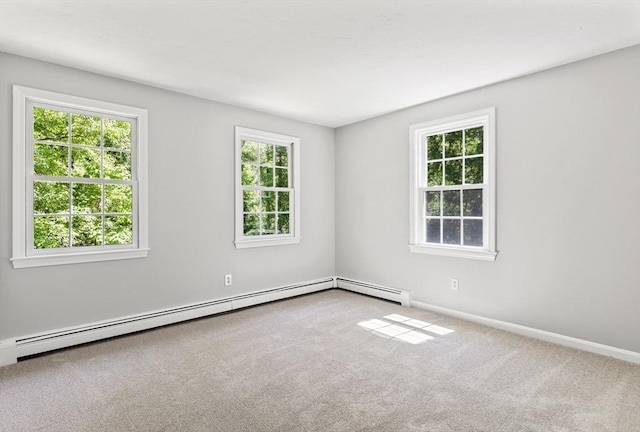 92 Clinton St, Hopkinton, MA 01748 - carpeted empty room featuring plenty of natural light and baseboard heating