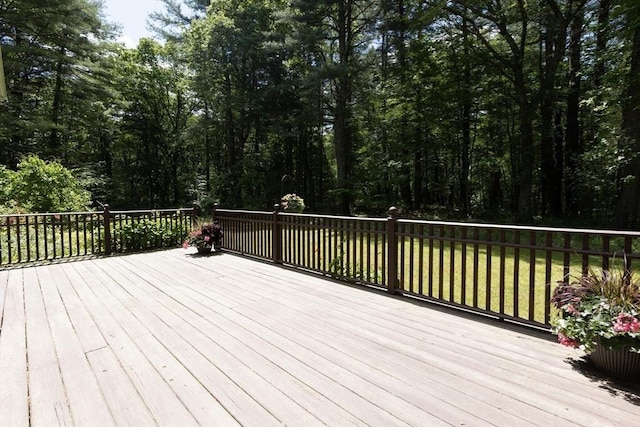 92 Clinton St, Hopkinton, MA 01748 - wooden terrace with a lawn