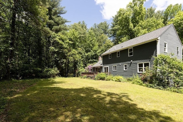 92 Clinton St, Hopkinton, MA 01748 - view of green lawn with a deck